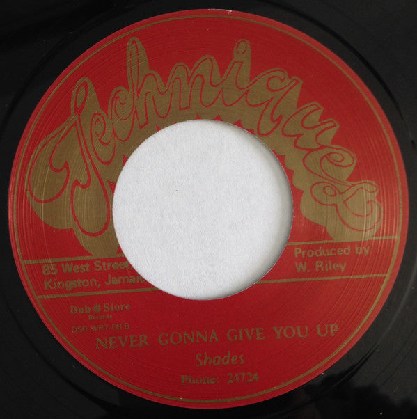 Shades (8) : She's Gonna Marry Me / Never Gonna Give You Up (7", RE)